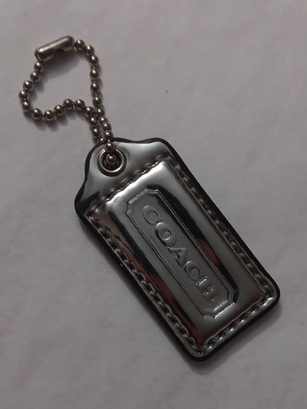 Coach Silver Rectangular Leather Tag Keychain with Ball Chain